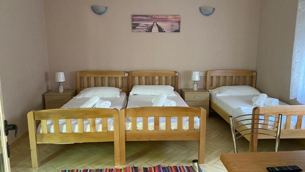 Postel nebo postele na pokoji v ubytování Hotel Durres Vila 53