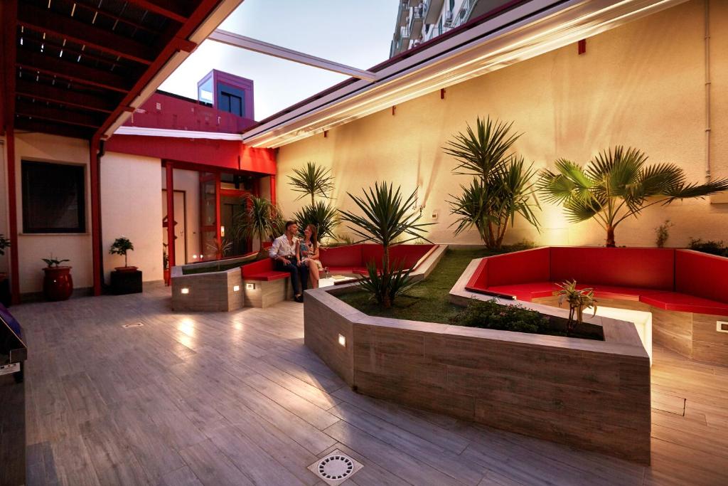 Posezení v ubytování Hospitality Hotel