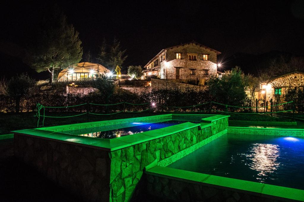 Bazén v ubytování La Castellaia Resort nebo v jeho okolí