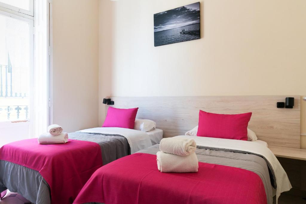 Postel nebo postele na pokoji v ubytování Red Nest Hostel