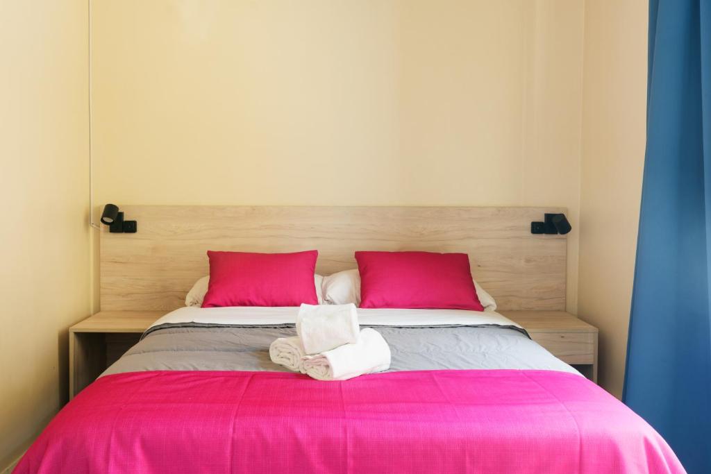Postel nebo postele na pokoji v ubytování Red Nest Hostel