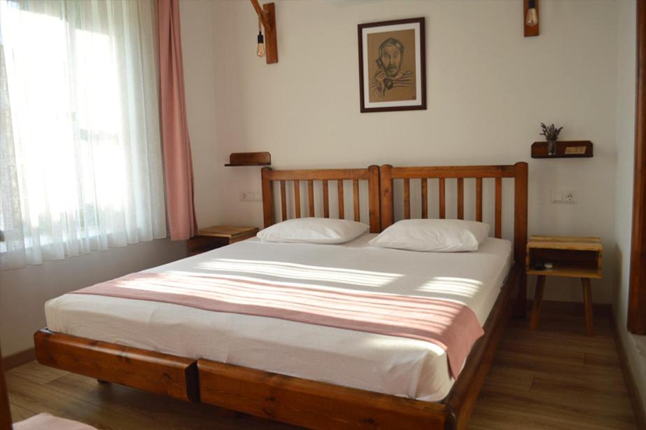Postel nebo postele na pokoji v ubytování Ayışığı Hotel
