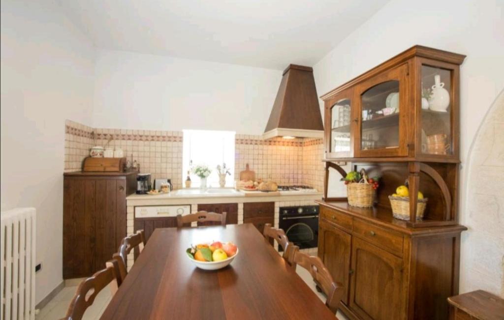 A kitchen or kitchenette at Trulli Francesca Ciclovia