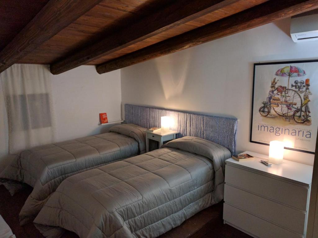 Postel nebo postele na pokoji v ubytování Lovely Stone House Conversano Puglia