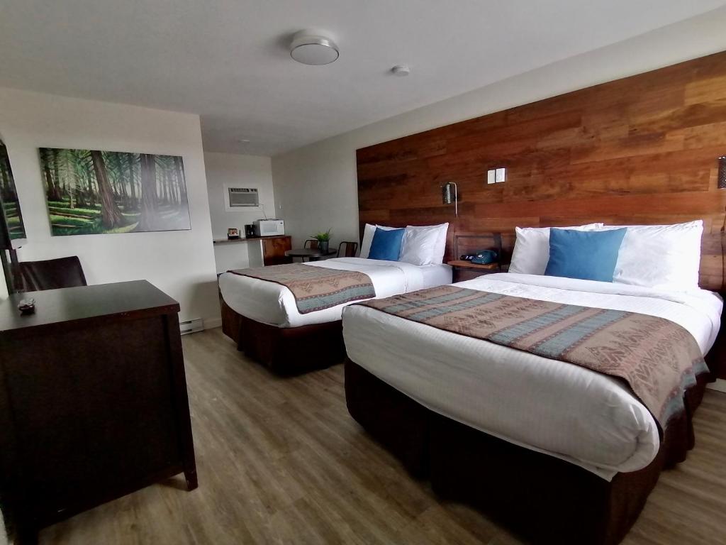 Postel nebo postele na pokoji v ubytování Snow Valley Lodging