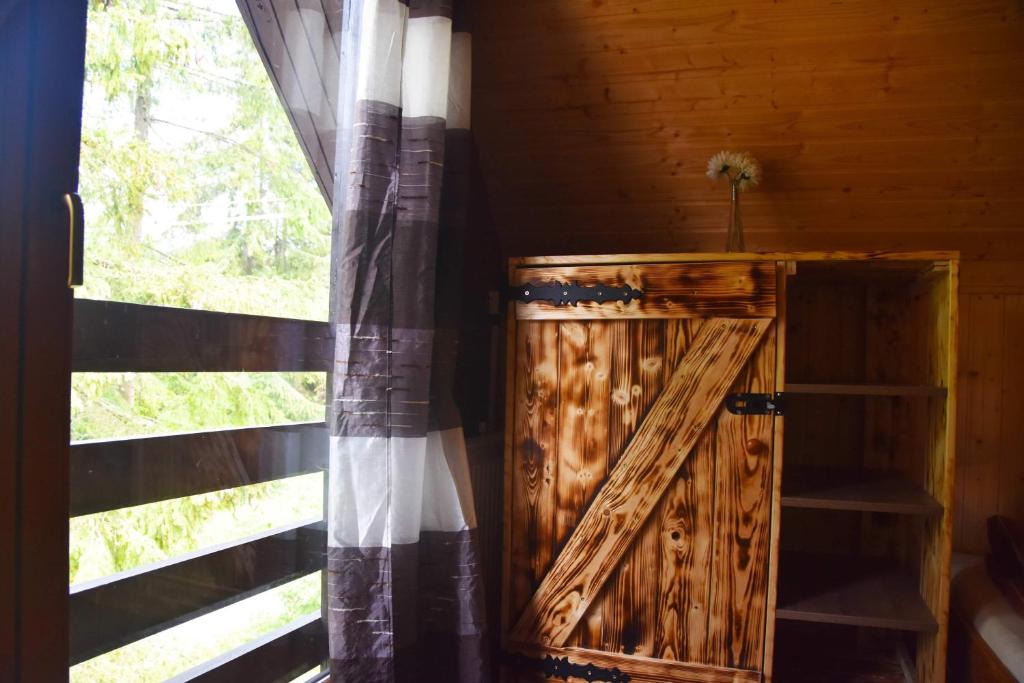 Palanda nebo palandy na pokoji v ubytování Chata Daniela
