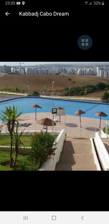 Bazén v ubytování Studio avec piscine Cabo Dream à Cabo négro nebo v jeho okolí