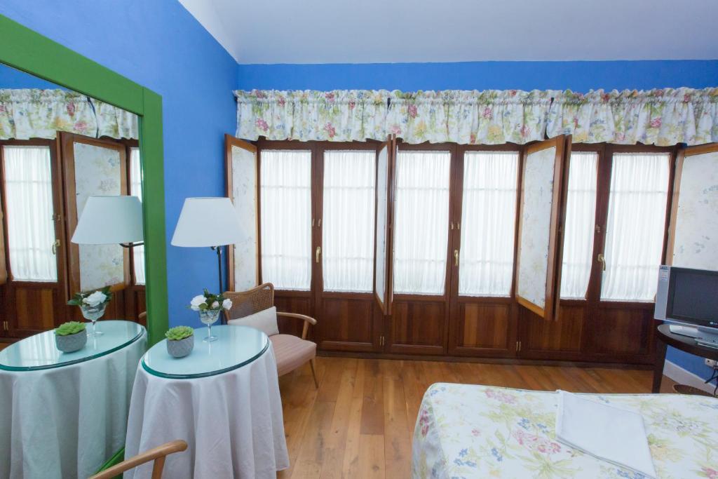 Postel nebo postele na pokoji v ubytování Hotel Rural Casa Xusto