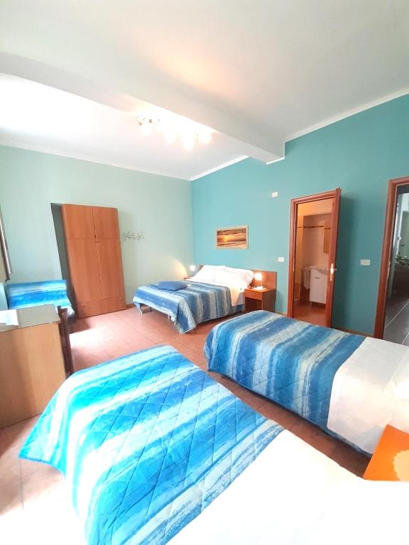 Postel nebo postele na pokoji v ubytování Hotel Alba Torino centro