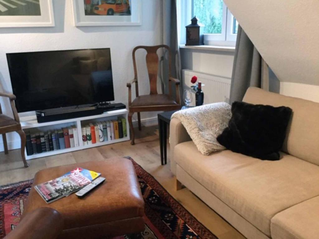 TV a/nebo společenská místnost v ubytování Ferienwohnung Bartel