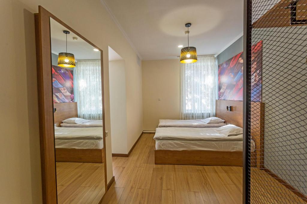 Postel nebo postele na pokoji v ubytování Koisha