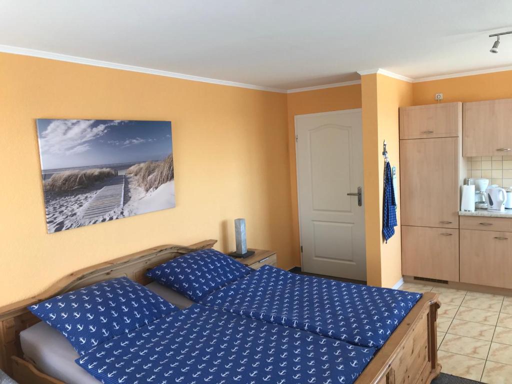 Postel nebo postele na pokoji v ubytování Residenz am Peeneplatz