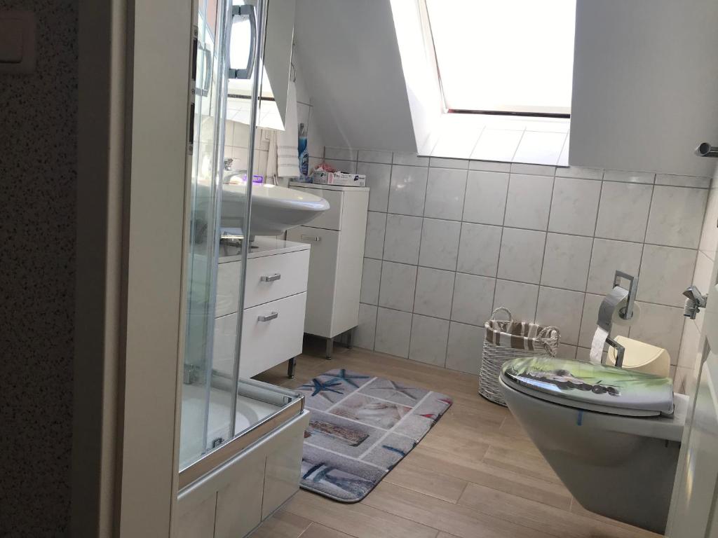 Koupelna v ubytování Residenz am Peeneplatz
