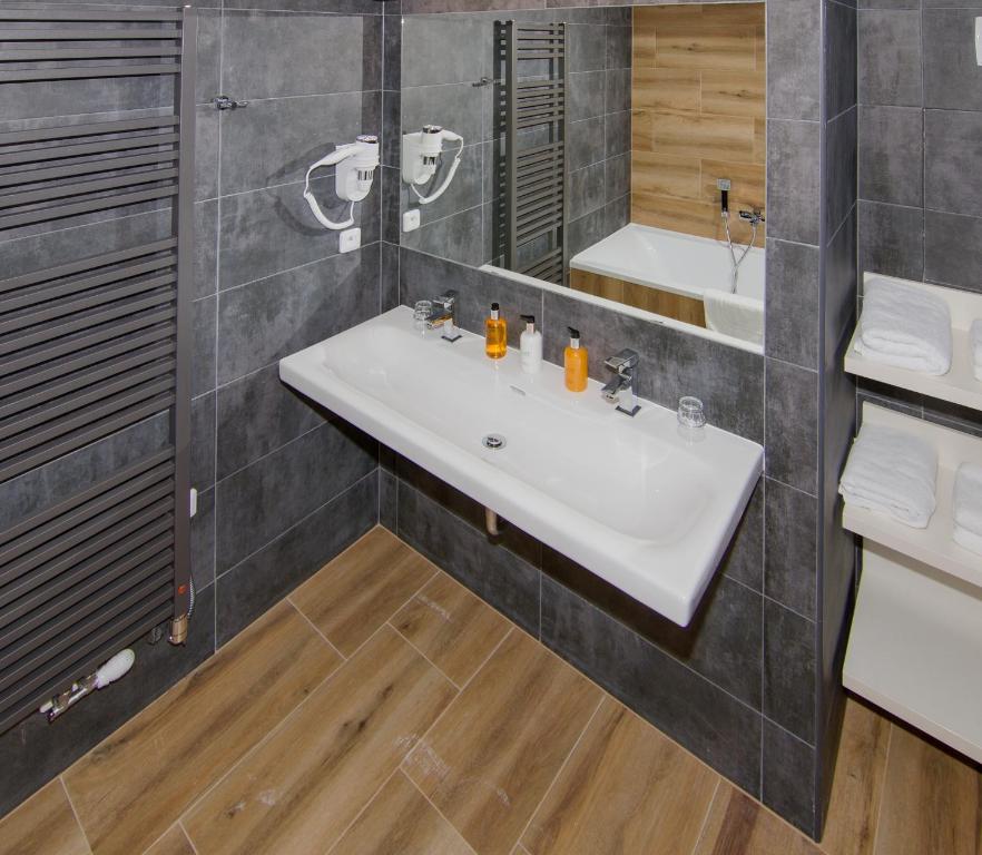 Koupelna v ubytování Hotel Srní a Depandance