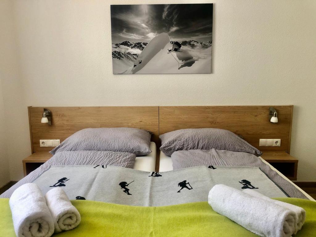 Posteľ alebo postele v izbe v ubytovaní valbel