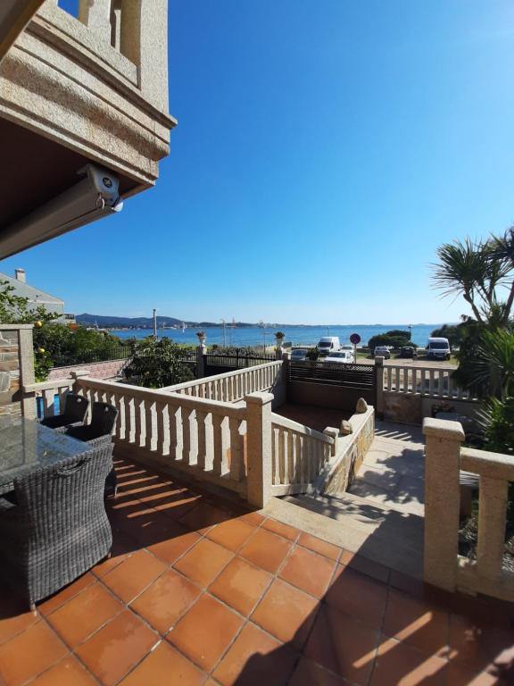 En balkon eller terrasse på Casa Cotón - Chalet vacacional de playa