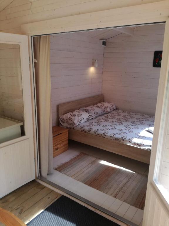 Postel nebo postele na pokoji v ubytování Jaagu majad