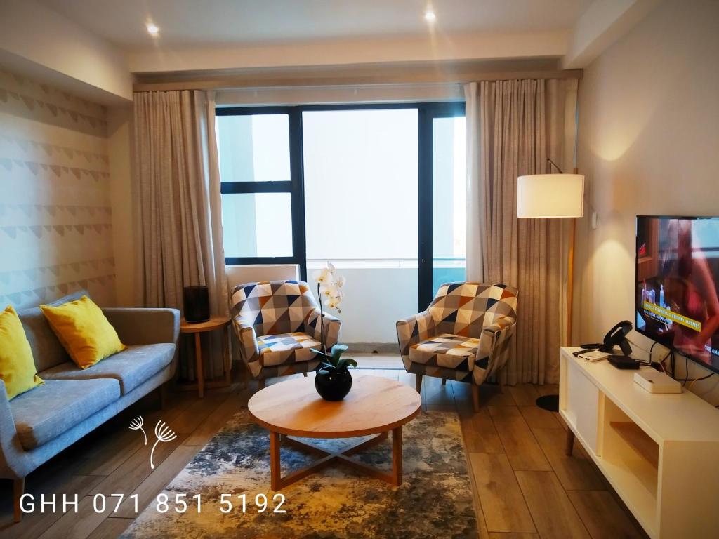 Posezení v ubytování Regency Apartment