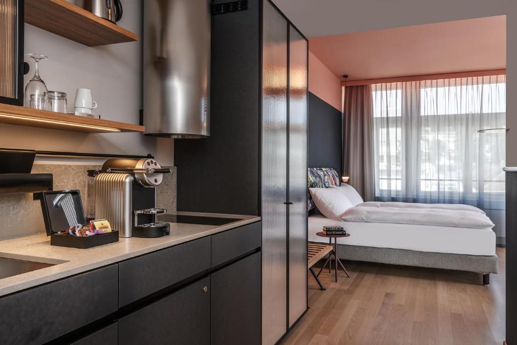 Postel nebo postele na pokoji v ubytování Sorell Hotel City Weissenstein - Boutique Hotel