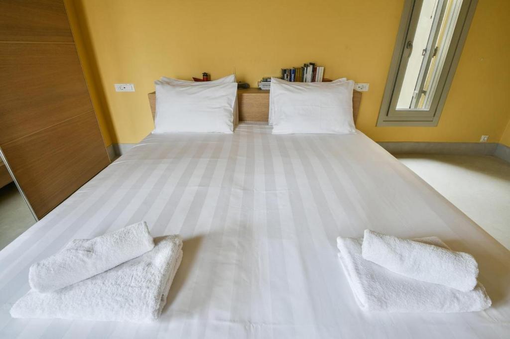 Postel nebo postele na pokoji v ubytování VILLA OTZIAS