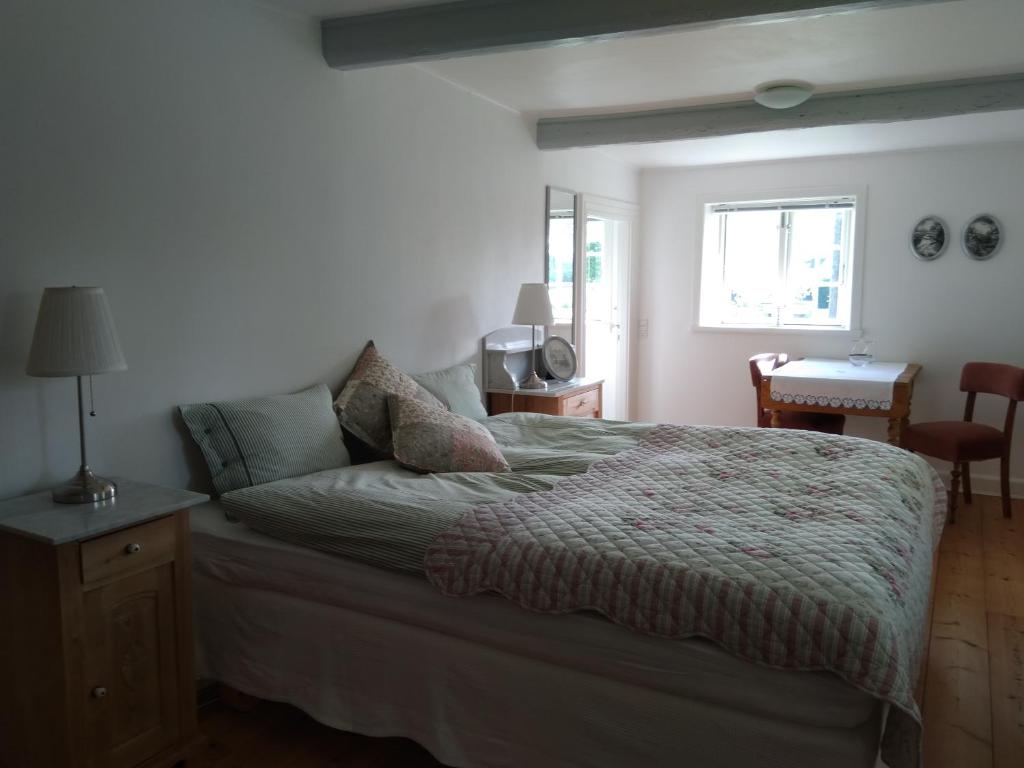 Postel nebo postele na pokoji v ubytování Baekgaarden B&B