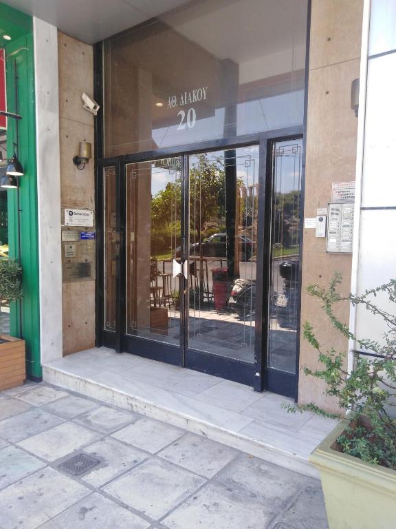 The facade or entrance of Parthenon Apartment
