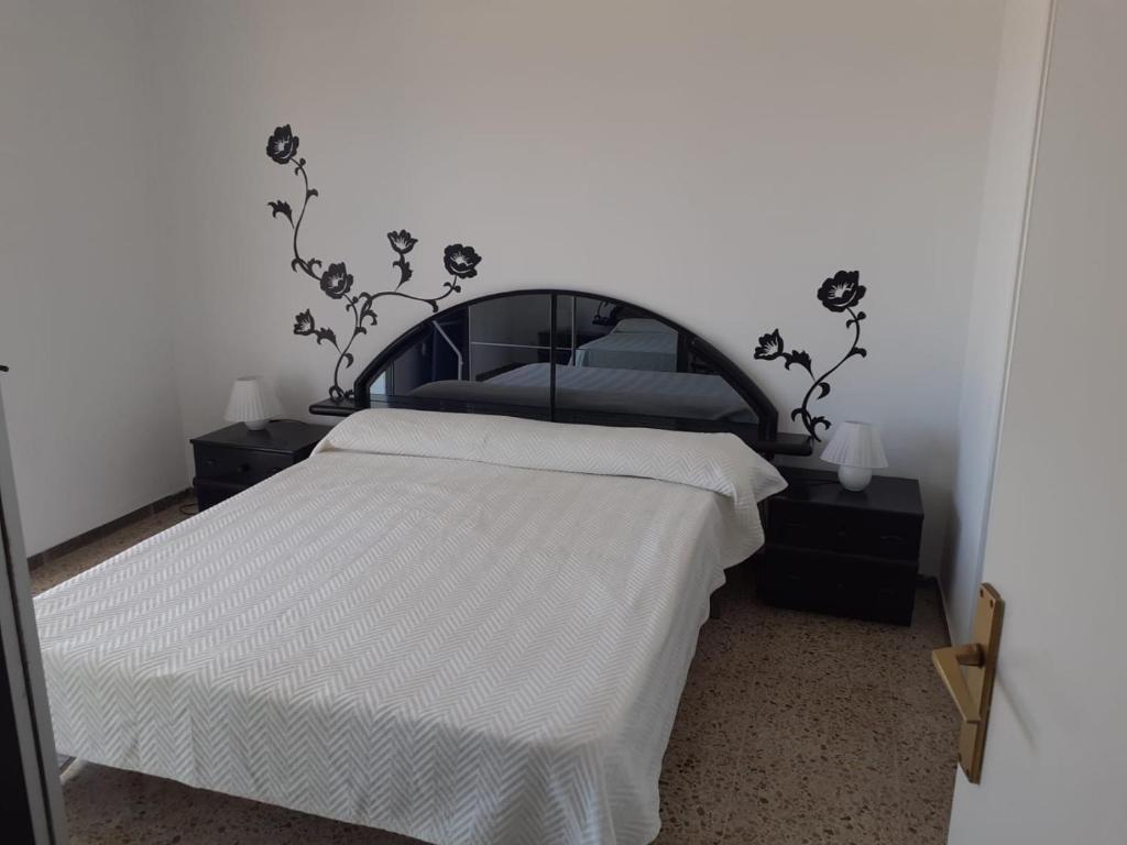 Postel nebo postele na pokoji v ubytování Suitur apartamento primera linea mar vistas playa
