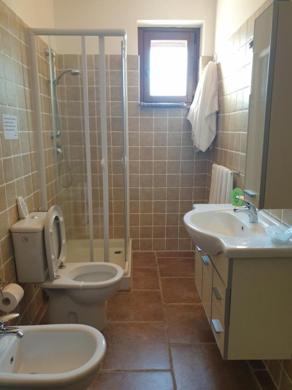 Koupelna v ubytování Agriturismo Diaccialone