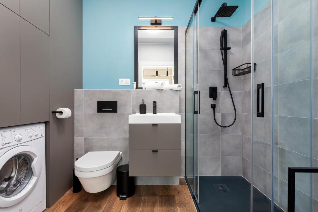 Kúpeľňa v ubytovaní Modern City Center Apartments by Noclegi Renters