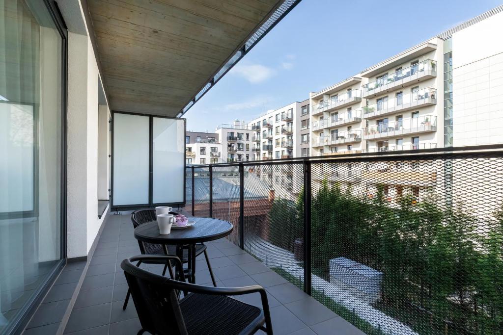 Balkón alebo terasa v ubytovaní Modern City Center Apartments by Noclegi Renters