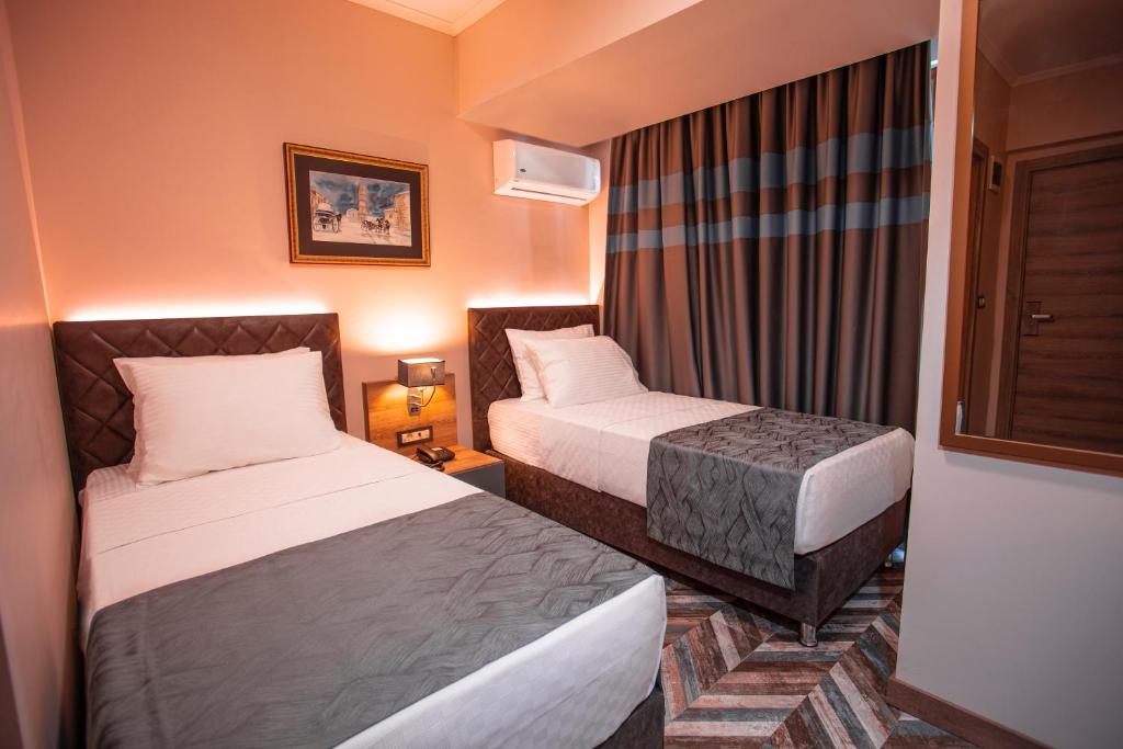 Postel nebo postele na pokoji v ubytování Hotel Kale 17