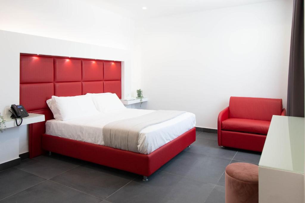 Postel nebo postele na pokoji v ubytování GRAND HOTEL SERAPIDE