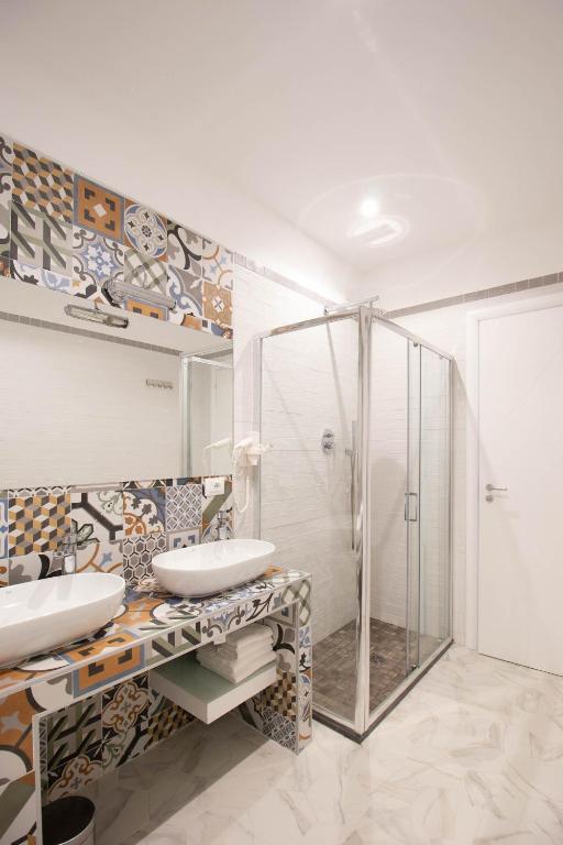 Koupelna v ubytování GRAND HOTEL SERAPIDE