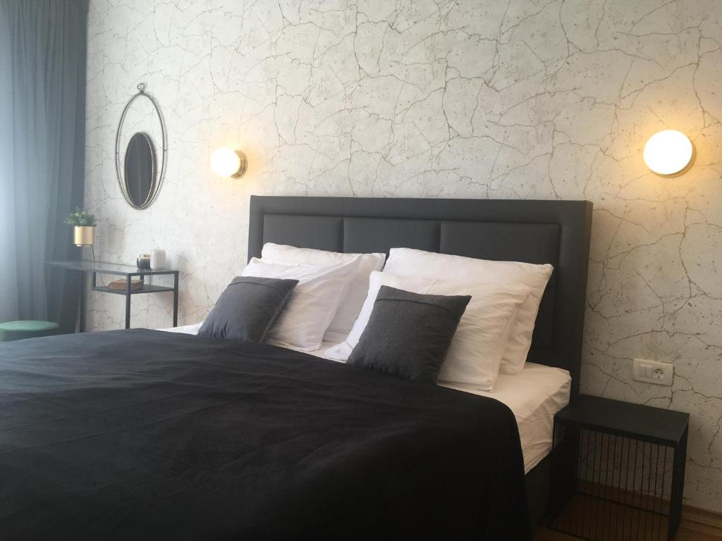 Postel nebo postele na pokoji v ubytování Apartments Jadranka