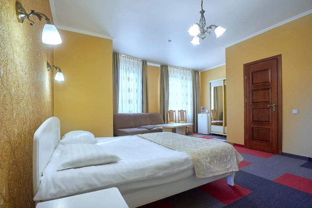 Postel nebo postele na pokoji v ubytování Na Horyzonti