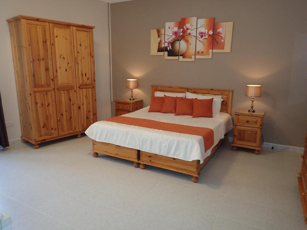 Postel nebo postele na pokoji v ubytování Duncan Guesthouse