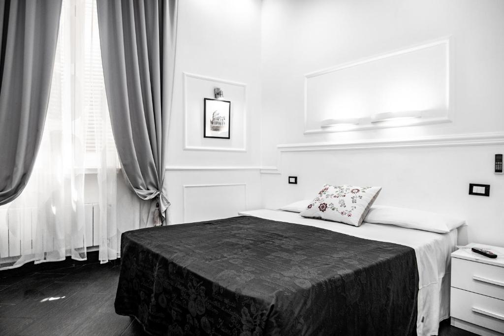 A bed or beds in a room at L'antica Locanda Dell'Orso