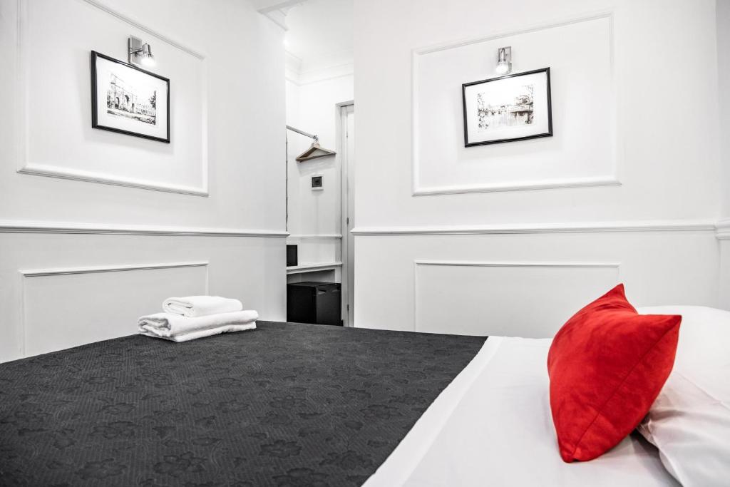 A bed or beds in a room at L'antica Locanda Dell'Orso