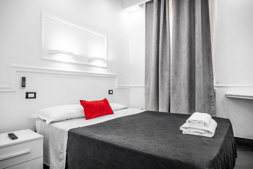 A bed or beds in a room at L'antica Locanda Dell'Orso