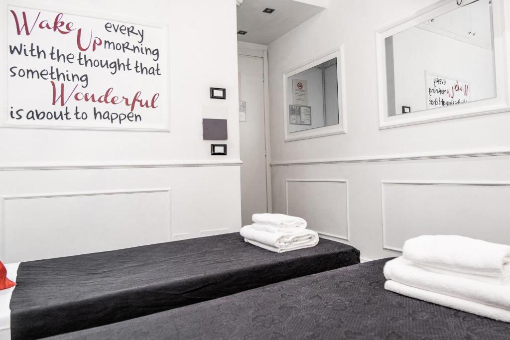 A bed or beds in a room at L'antica Locanda Dell'Orso