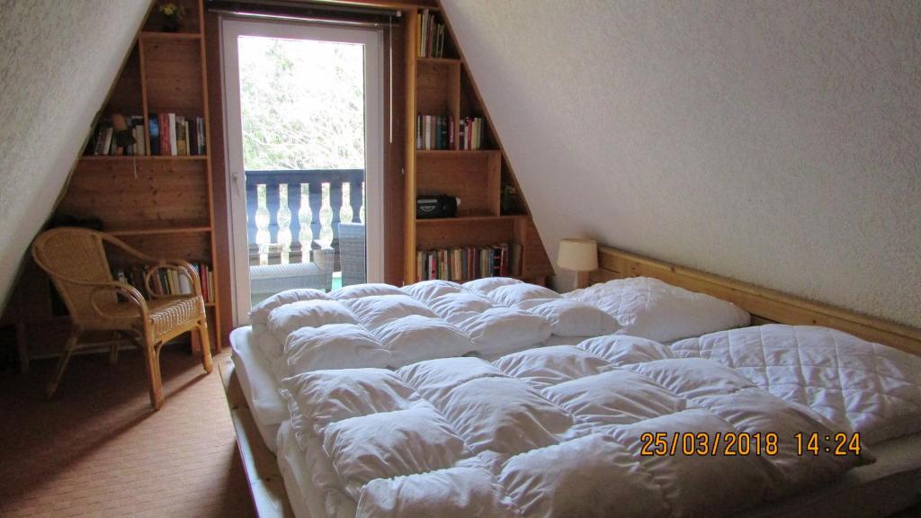 Postel nebo postele na pokoji v ubytování Finnhaus Neubauer