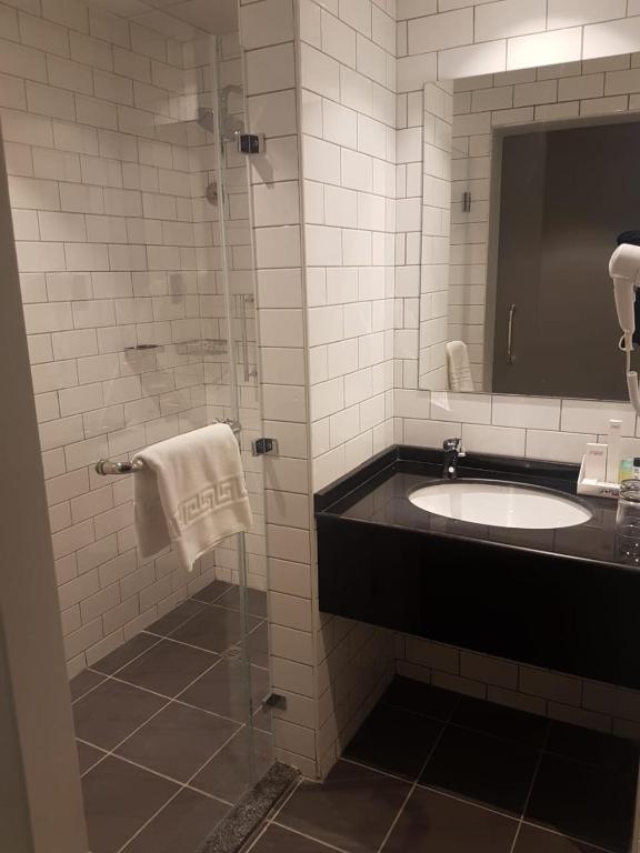 Koupelna v ubytování FORTUNE ATRIUM HOTEL