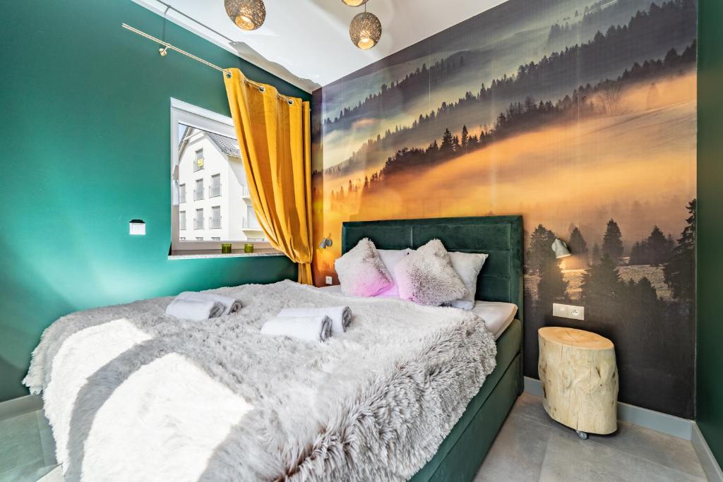Posteľ alebo postele v izbe v ubytovaní Apartamenty Pod Gondola Świeradów