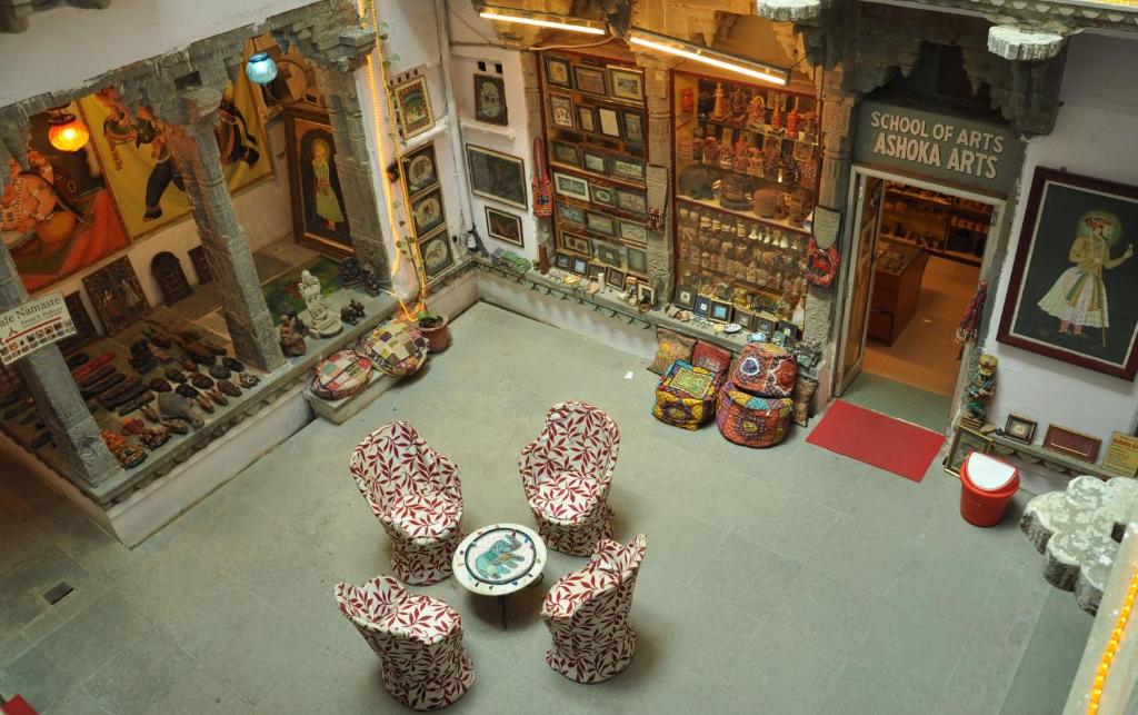 an overhead view of a store with chairs and tables at Hotel Gangaur Palace in Udaipur