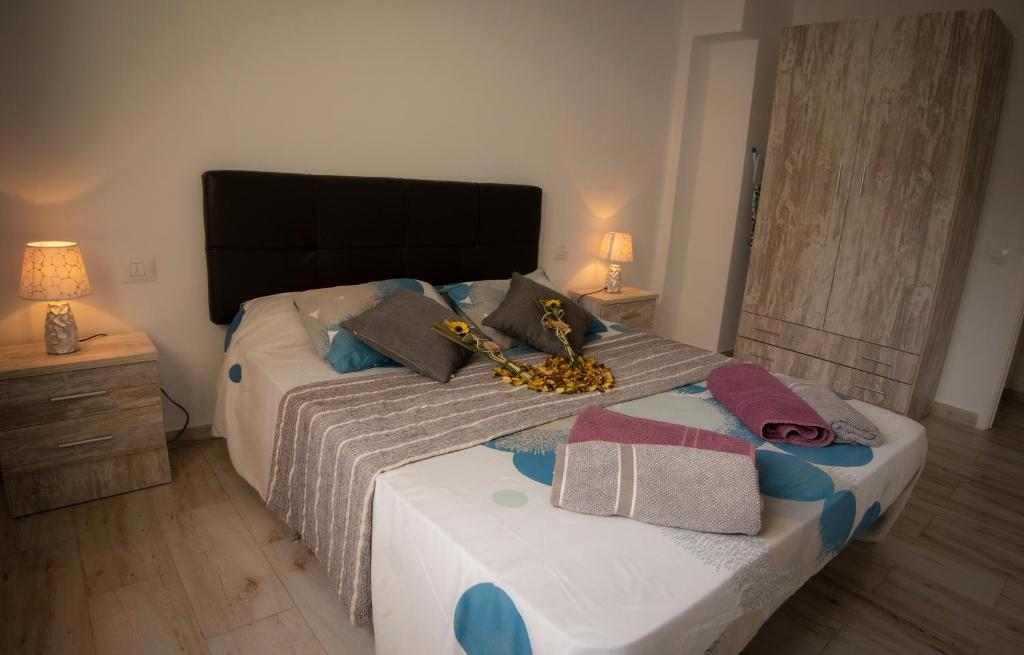 Postel nebo postele na pokoji v ubytování EL CARMEN beach apartment