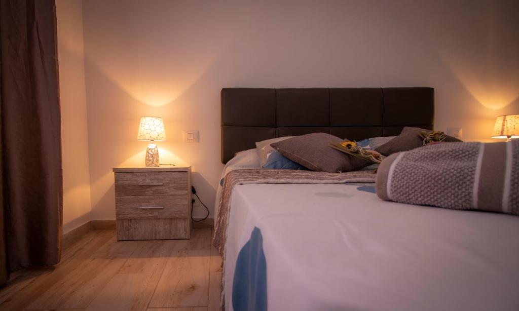 Postel nebo postele na pokoji v ubytování EL CARMEN beach apartment