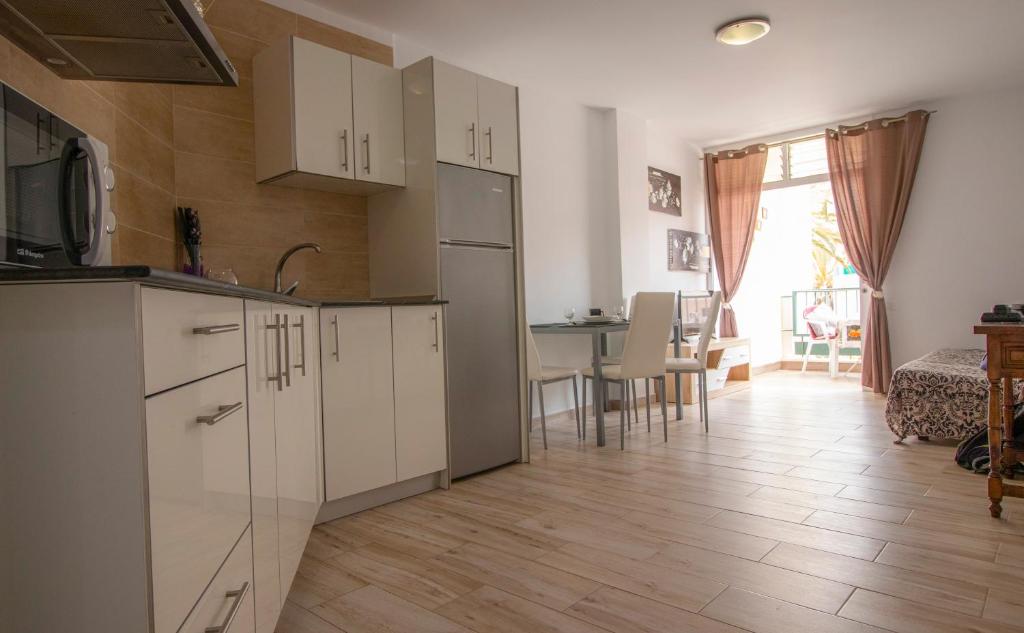 Kuchyň nebo kuchyňský kout v ubytování EL CARMEN beach apartment