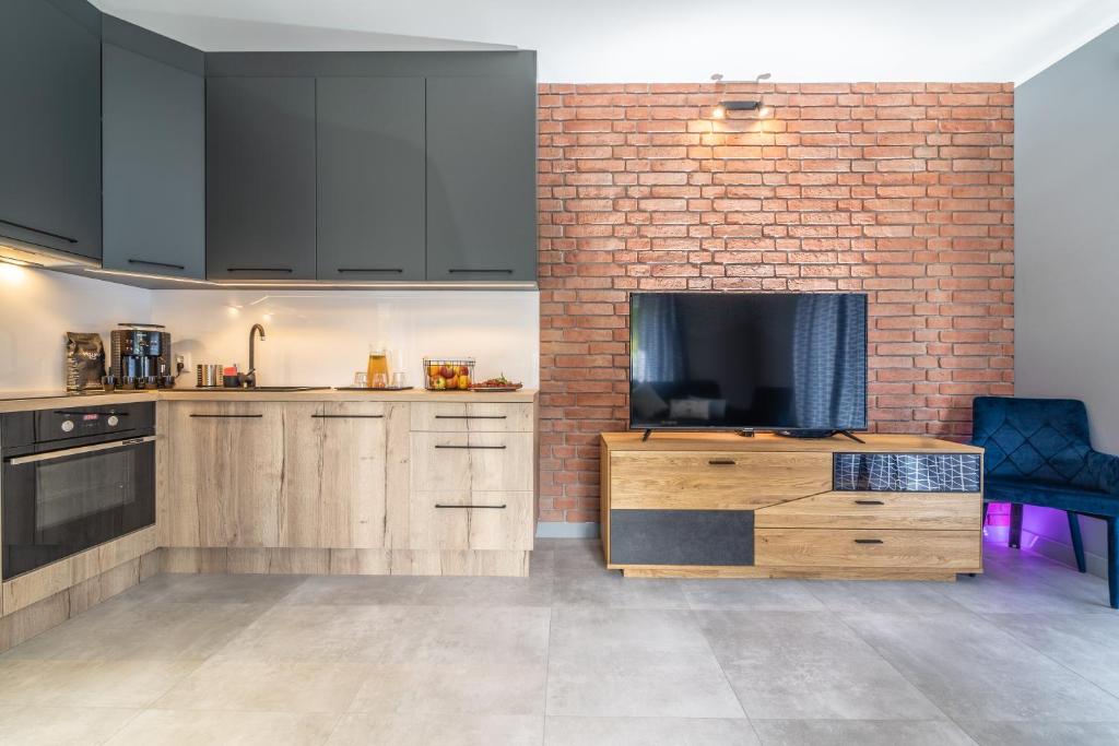 Kuchyňa alebo kuchynka v ubytovaní Apartamenty Pod Gondola Świeradów