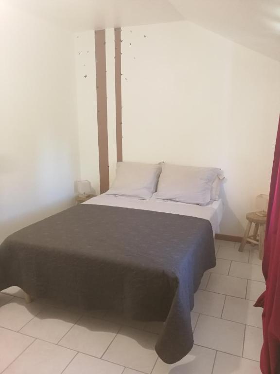 Postel nebo postele na pokoji v ubytování Mas des gardies