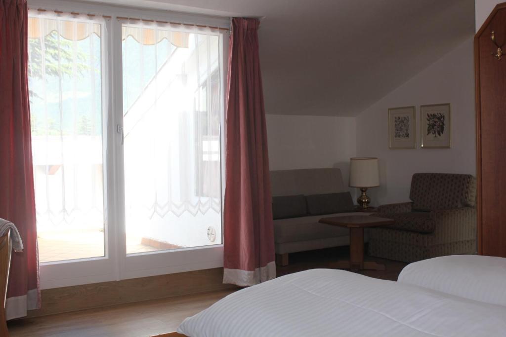 Postel nebo postele na pokoji v ubytování Hotel Annabell